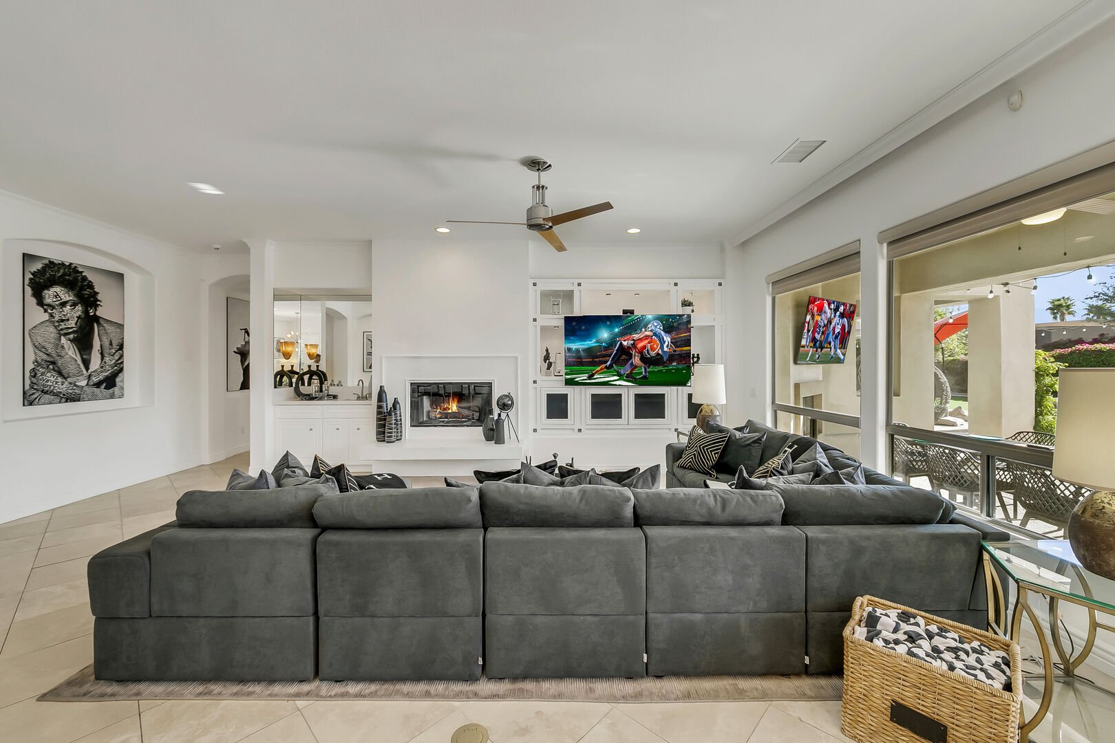 Watch the game on the large HDTV from the oversized cozy couch.