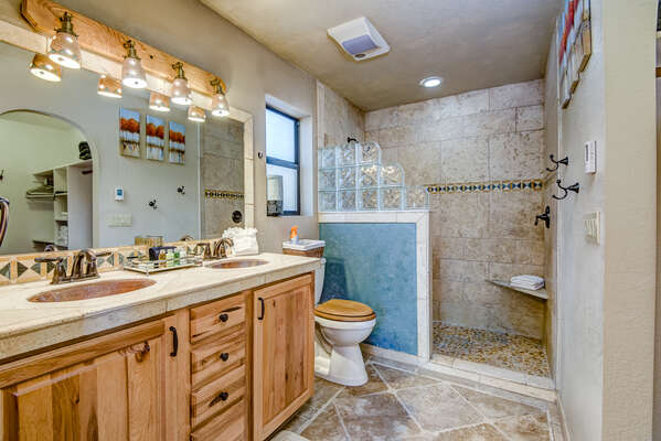 Master Bath with Copper Sinks and a Tile Shower