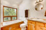 The master bath has a large over-sized Jacuzzi tub and fabulous views.