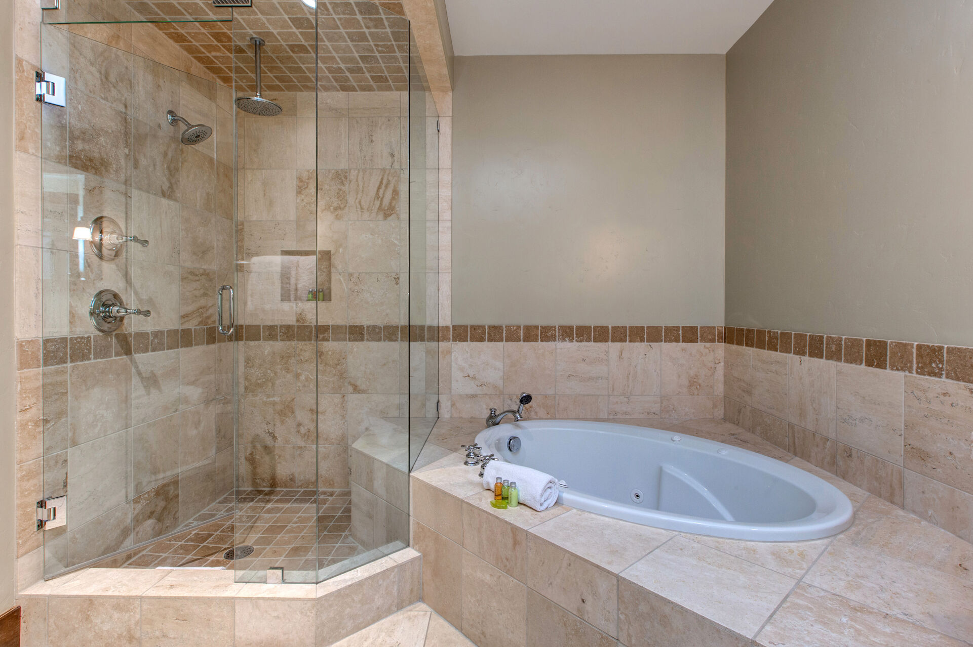 Master Bath with a Jetted-Tub a Large Tile Shower with Dual Shower Heads