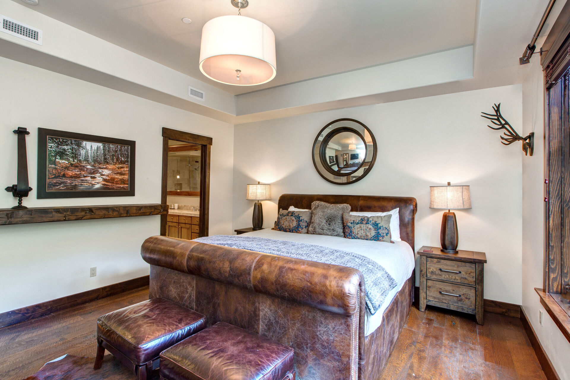 Master Bedroom with a King Bed, a Smart TV,  and Private Bathroom