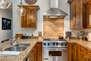 Fully Equipped Kitchen With High-end Stainless Steel Appliances and Granite Counters