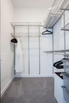 Master Closet Offers Guests Plenty of Space to Store Clothing.