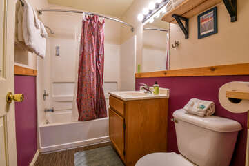 Bathroom with Purple walls and Full Bath/Shower