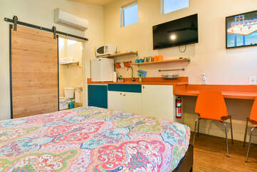 Kitchenette in front of the bed of this vacation rental in Moab Utah.