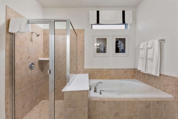 Featuring a garden tub and a walk-in shower