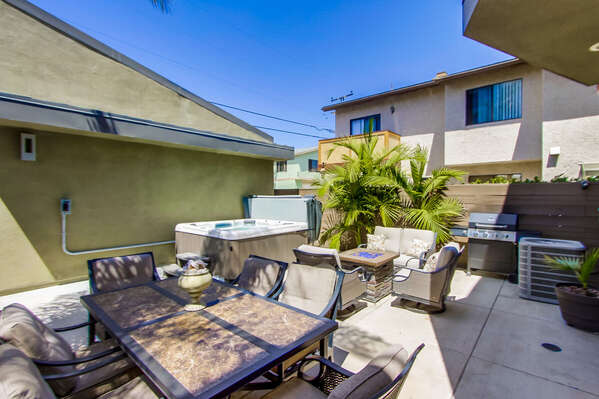 Image of Back Patio with BBQ and Hot Tub.