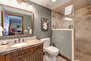 Private Bath with a Gorgeous Tile Shower, Granite Countertop Sink and Radiant Heat Flooring