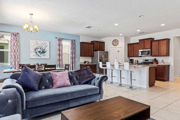 The living area flows right into the kitchen and dining area