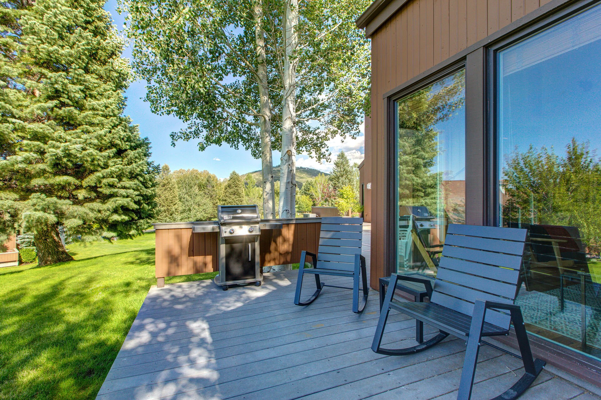 Private Back Patio with Propane BBQ and Rocking Chairs for Two
