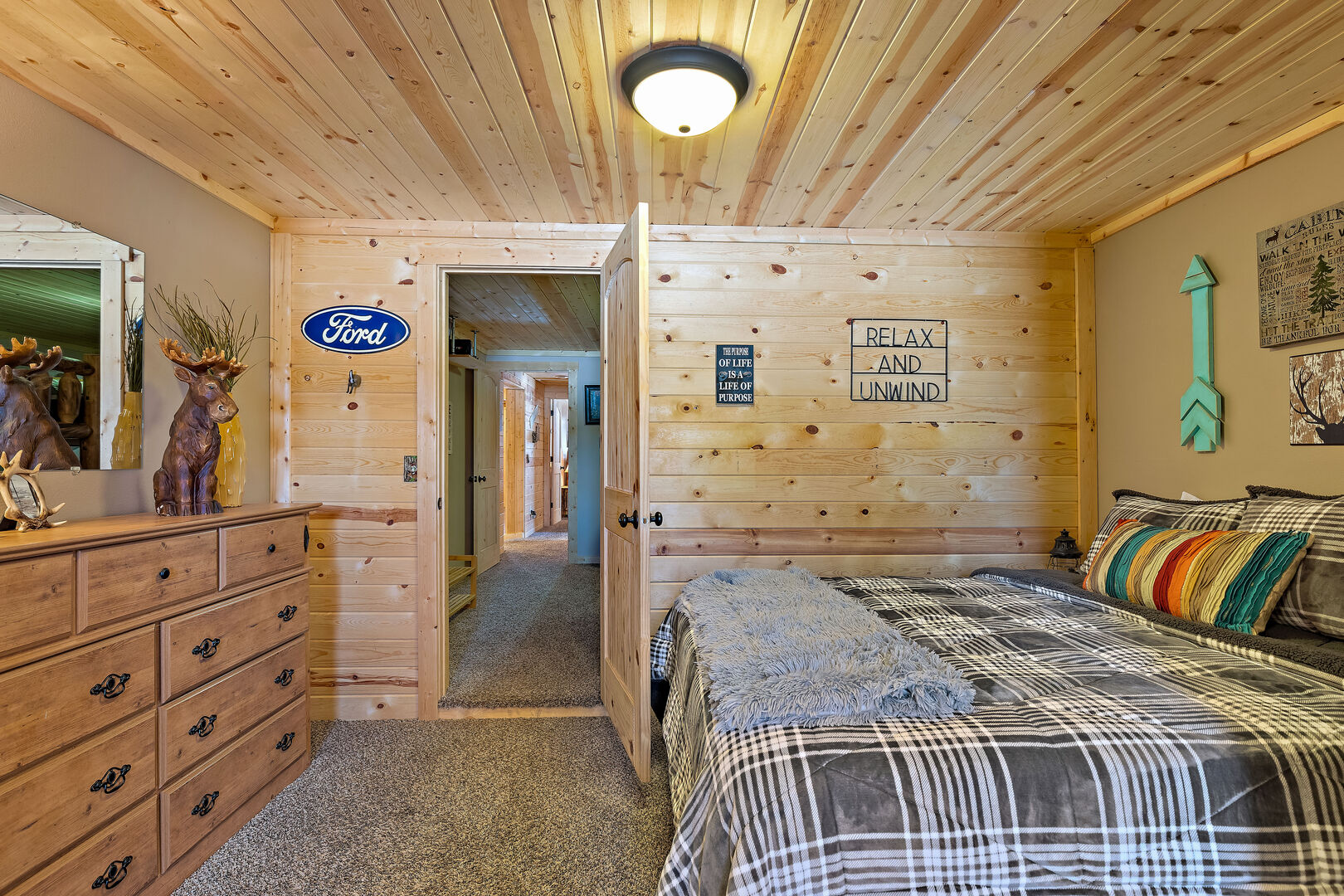 Huckleberry Hollow ~ bedroom #4 w/ queen bed and full sleeper sofa. ACCESS THRU ROOM #3 ONLY