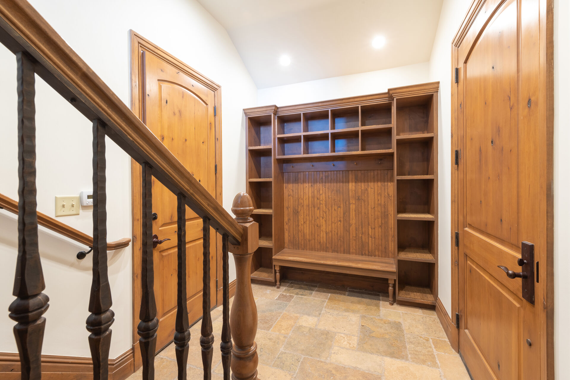 Spacious entry mudroom with cubbies to store gear