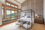 Master bedroom with custom king size bed and sweeping valley views