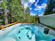 The hot tub looks out on beautiful views and is great to enjoy!