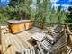 There's a nice deck with furniture and a hot tub to enjoy.