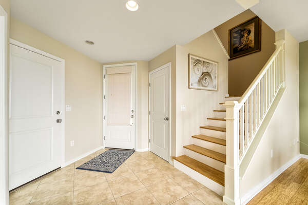 Condo entrance/Stairs to bedrooms