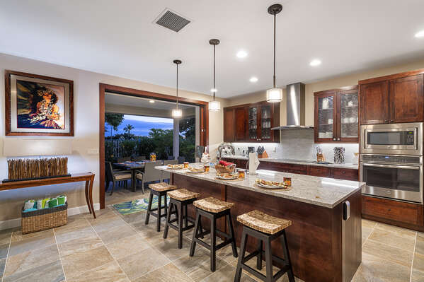 The kitchen includes a breakfast bar with seating for 4.