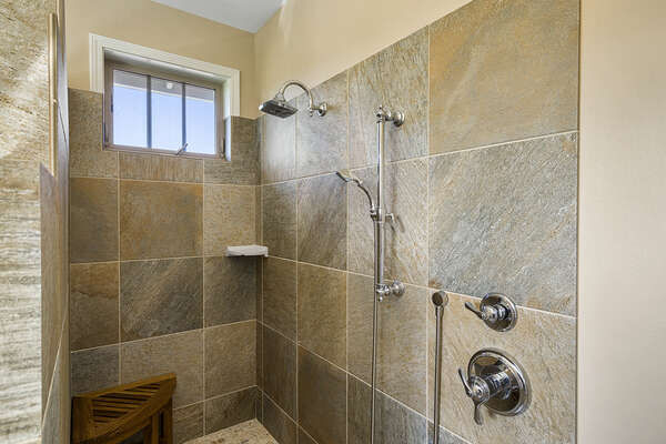 The walk-in shower of the master bathroom.