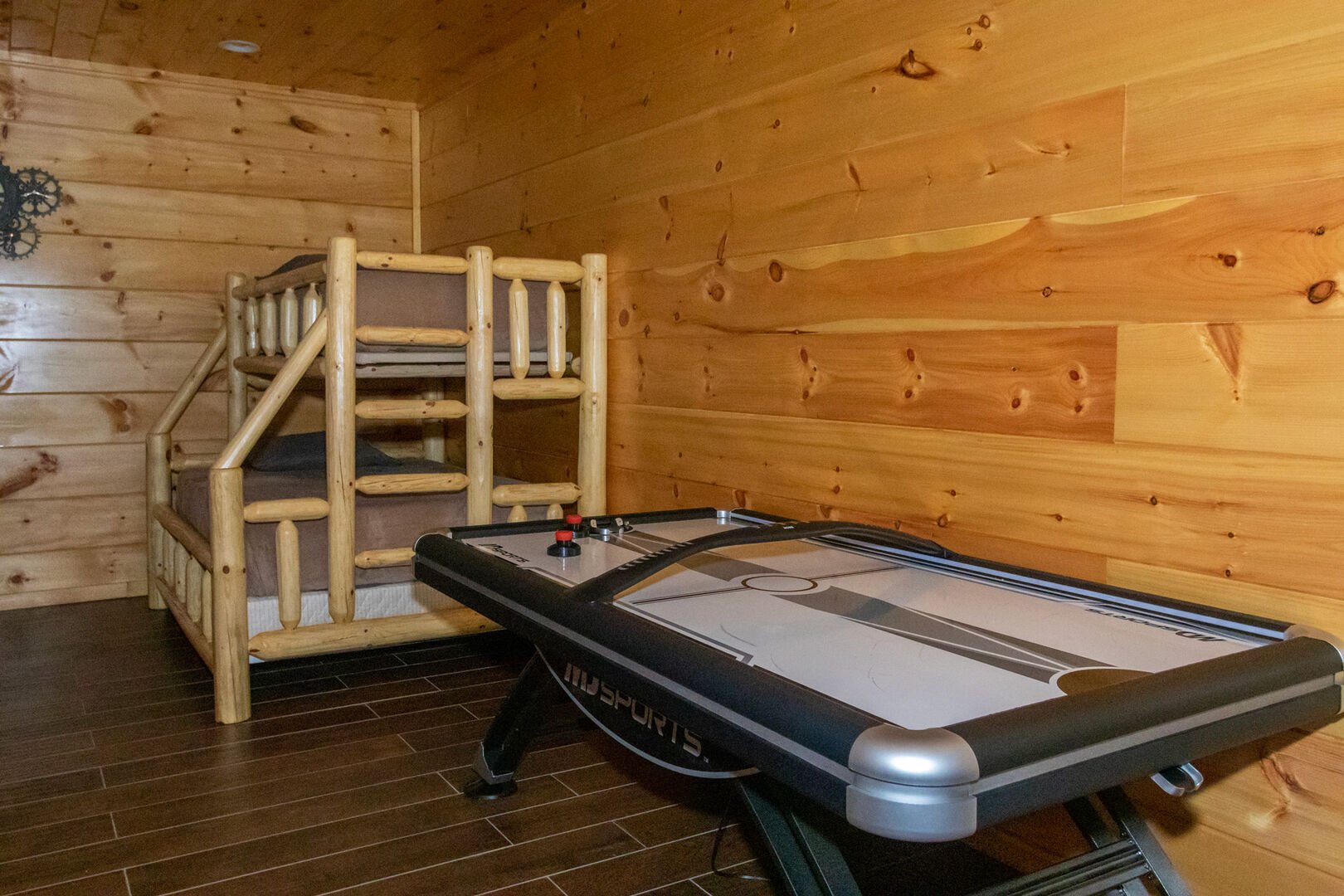 Air hockey table, pool table, and foosball