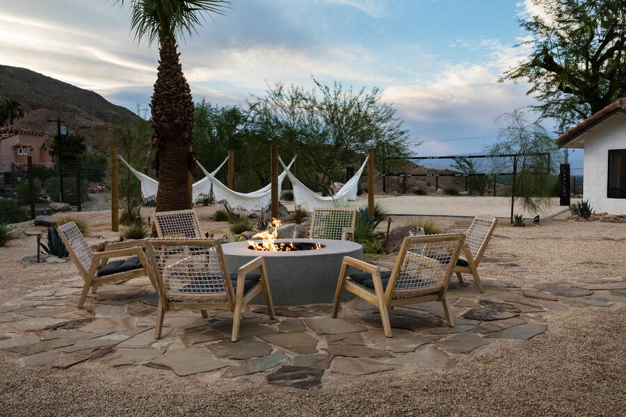 Outdoor fire pit with seating for 6. Grab a beverage and catch up with friends and family!