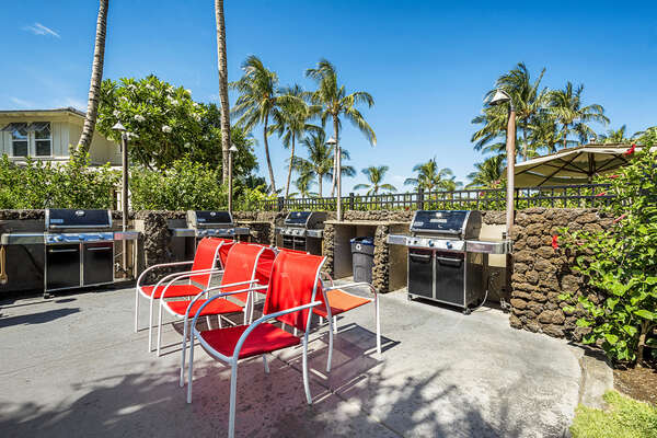 Outdoor Area with BBQs and Red Seating at Waikoloa Hawaii Vacation Rentals
