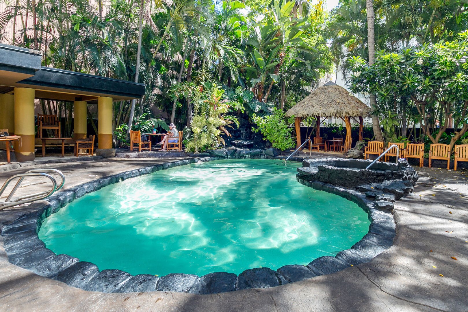 Beautiful tropical pool area with hot tub on the ground floor