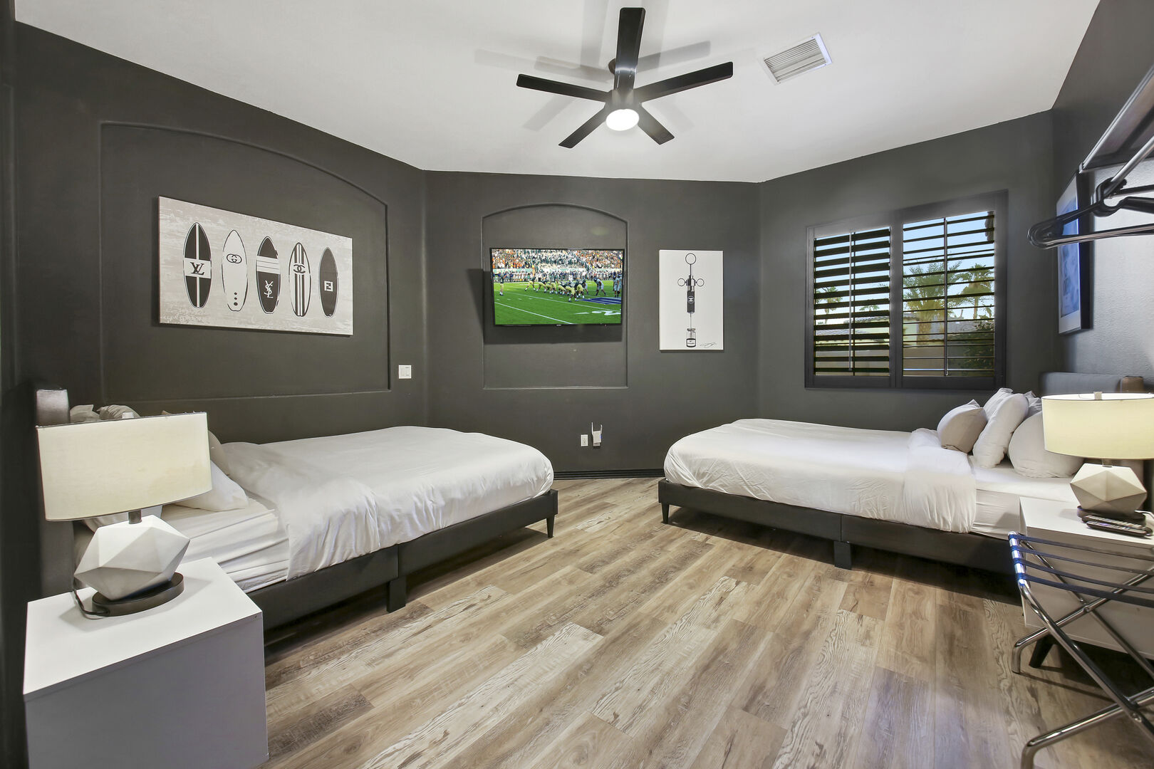 Bedroom 4 has 2 King-size beds and a 55-inch HDTV.