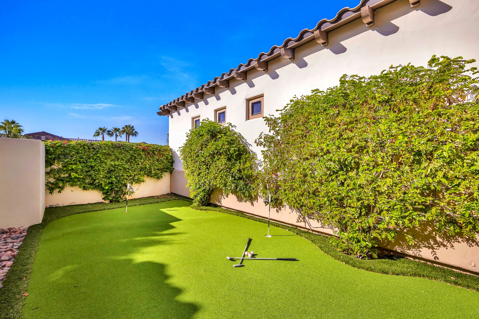 The owner made use of the oversized courtyard and put in a putting green to challenge your golf skills
