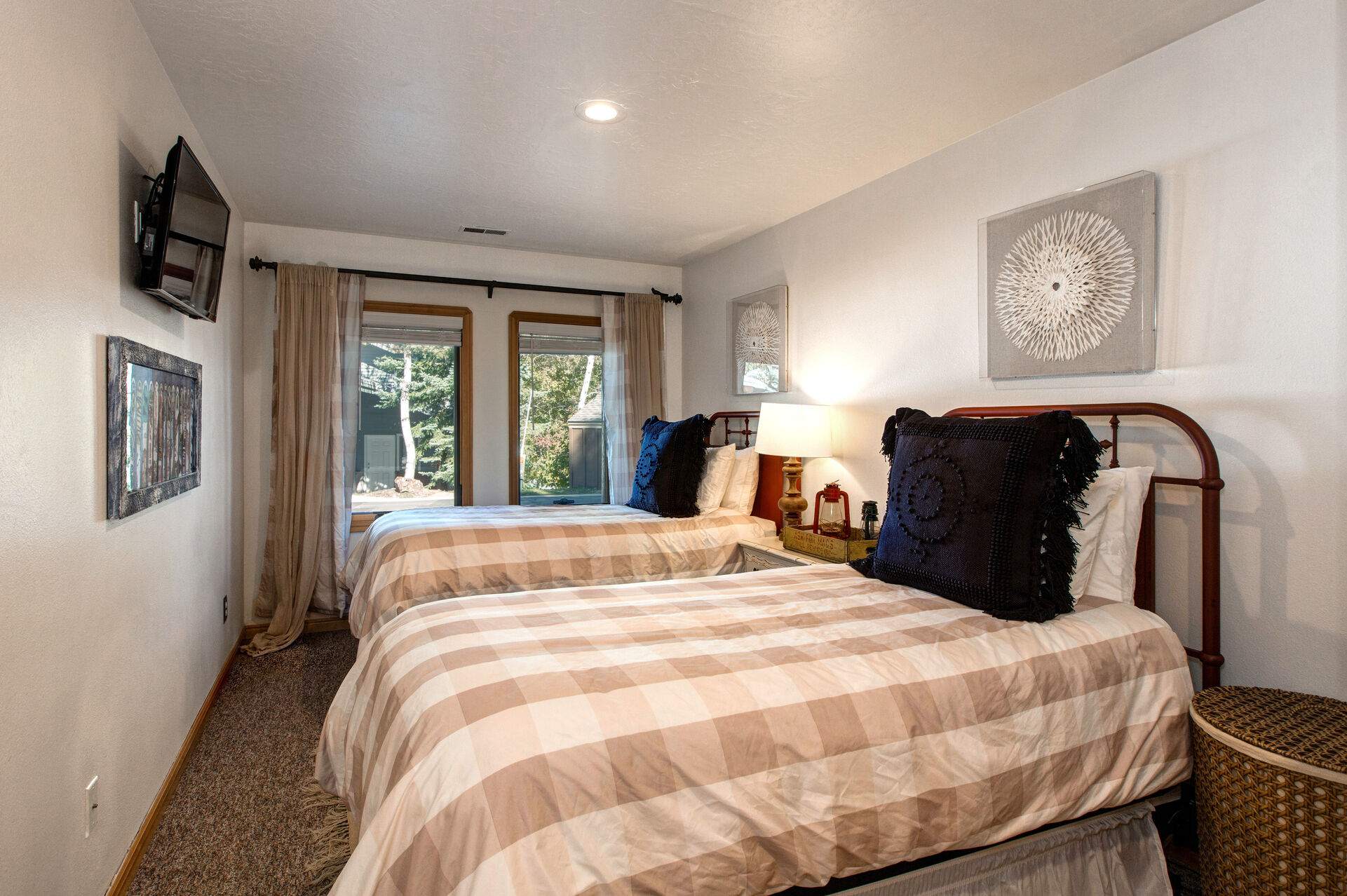 Ground Level Bedroom 3 with Two Twin Beds, Smart TV, and Private Bathroom