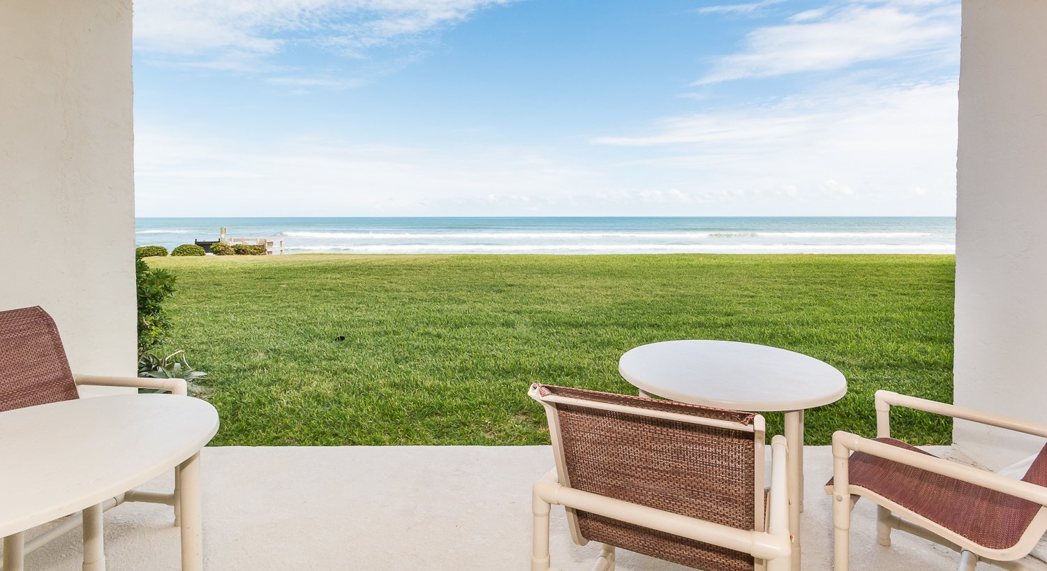Enjoy the outdoor seating set in the patio with ocean view