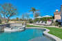 Lounge in the sun, play in the grass, swim in the pool or relax in the spa! This backyard is a true oasis.