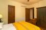 Downstairs Bedroom / Queen Size Bed / Armoire / Chair / with Full Bathroom