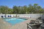 Backyard pool at this Seagrove Beach Rental with lounge chairs