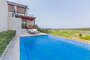 Enjoy the pool with a view of the ocean and golf course