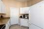 Kitchen leads to laundry room.  Look at the little coffee nook!