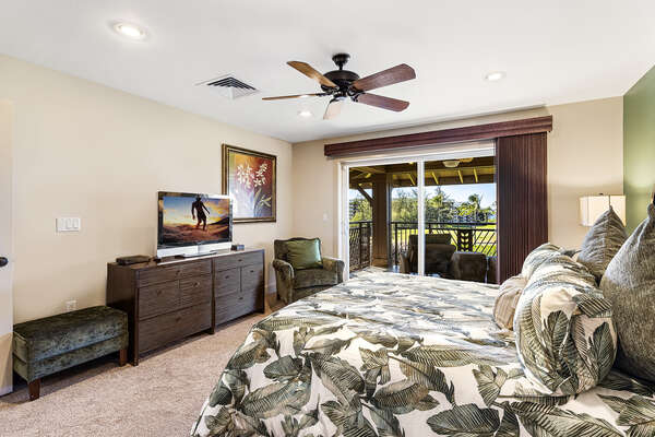 Master Bedroom with a view to the sliding glass doors to the private lanai.