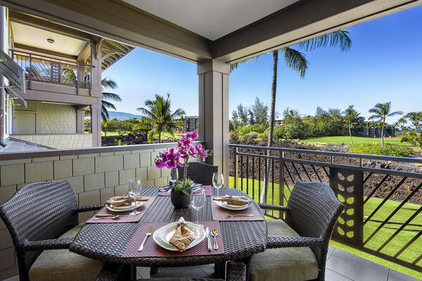 Private lanai with set wicker table and seating for 4.