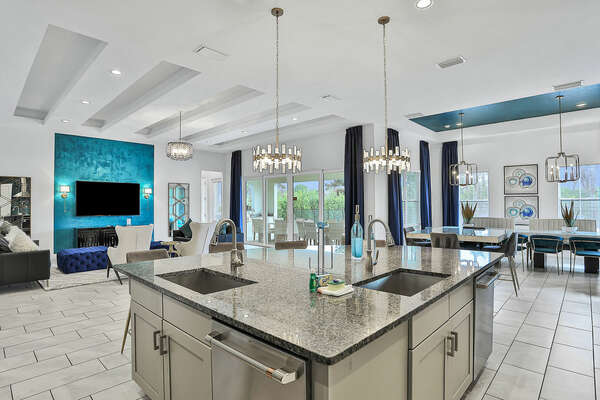 A huge island provides plenty of counter space and dual sinks