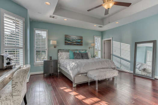 Main Level Grand Master Bedroom with a Luxury King Bed, 65