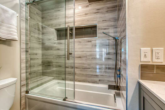 Main Level Full Shared Bath with a Tub Shower