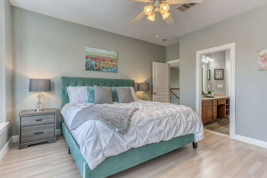 Upper Level King Bedroom 5 with a Luxury King Bed and Private Access to a Full Shared Bath