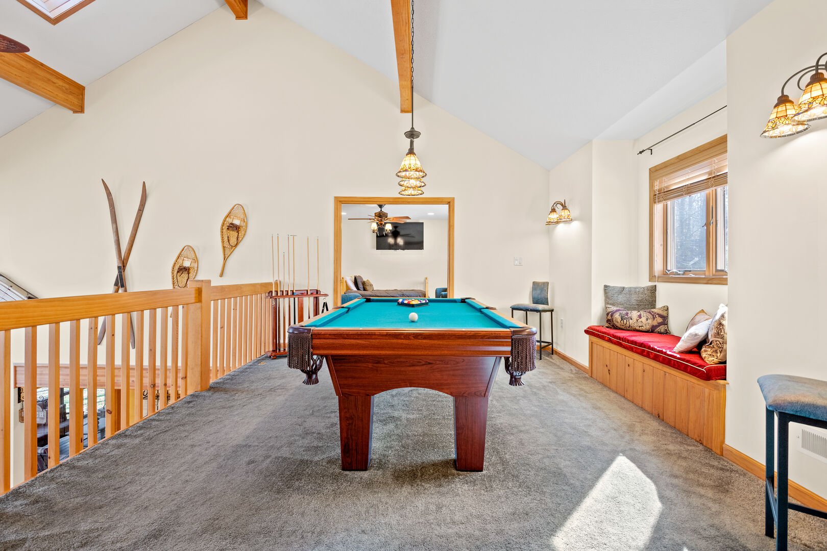 Tricky Tee's Game Room with a Pool Table