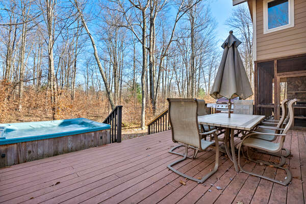 Deck with Outdoor Seating and a Hot Tub