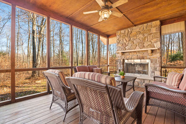 Room with Deck Seating, Ceiling Fan, and Fire Place