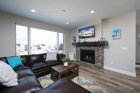 Living Room with Gas Fire Place & Satellite TV