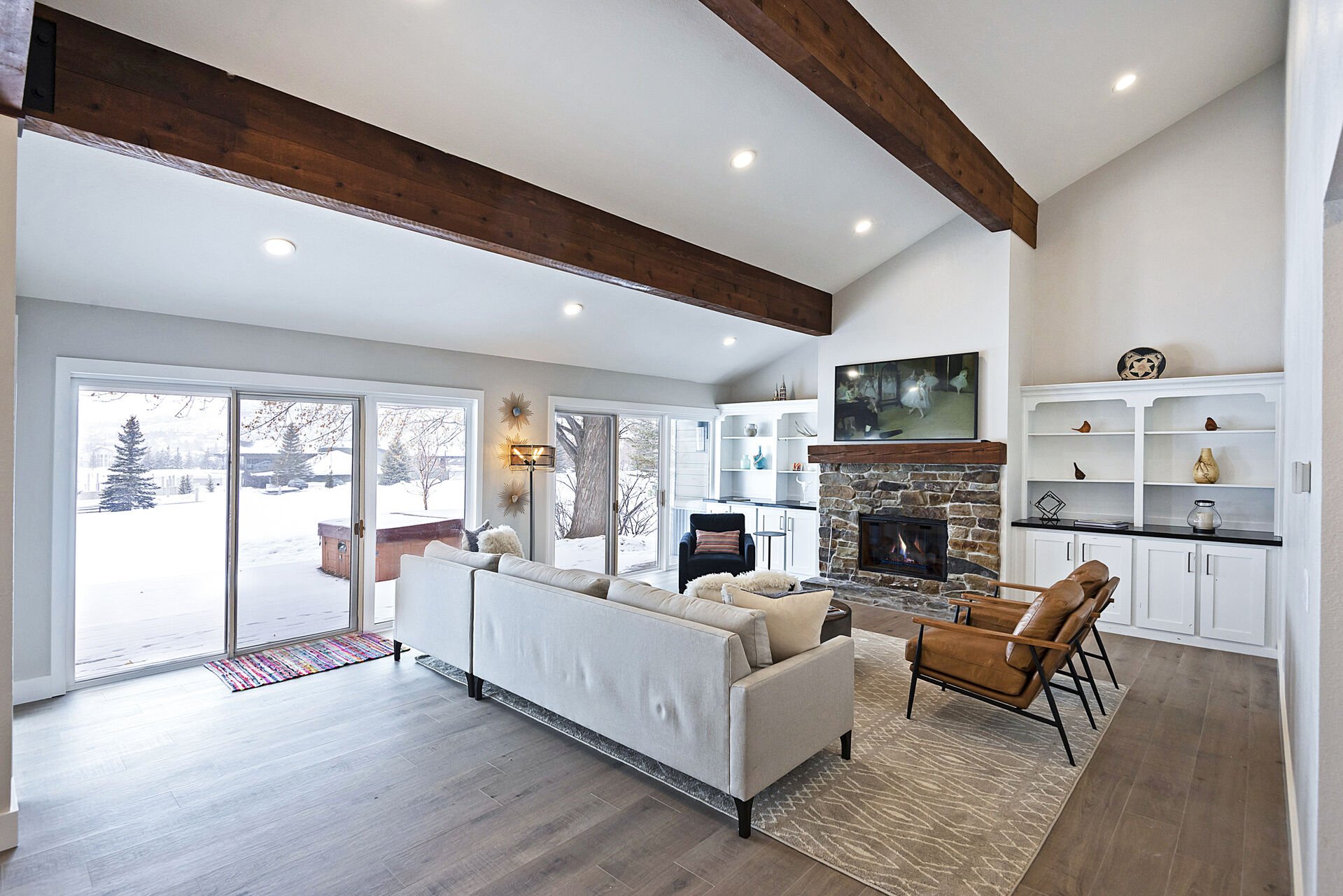 Living Room with Vaulted Ceilings, Comfortable Furnishings and Patio Access