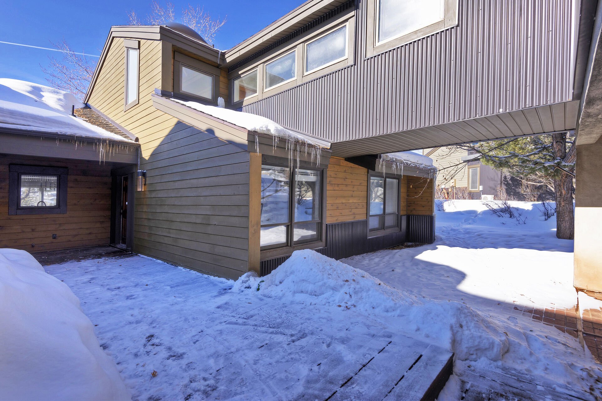 Upper Level Mud Room Access to the Home and Exterior Front Door and Patio