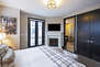 Master Bedroom with a Gas Fireplace, 55
