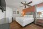 Large Bedroom with Orange Accent Wall