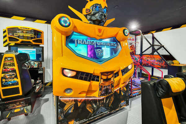 Grab a friend for a two-player game on the Transformers Human Alliance arcade